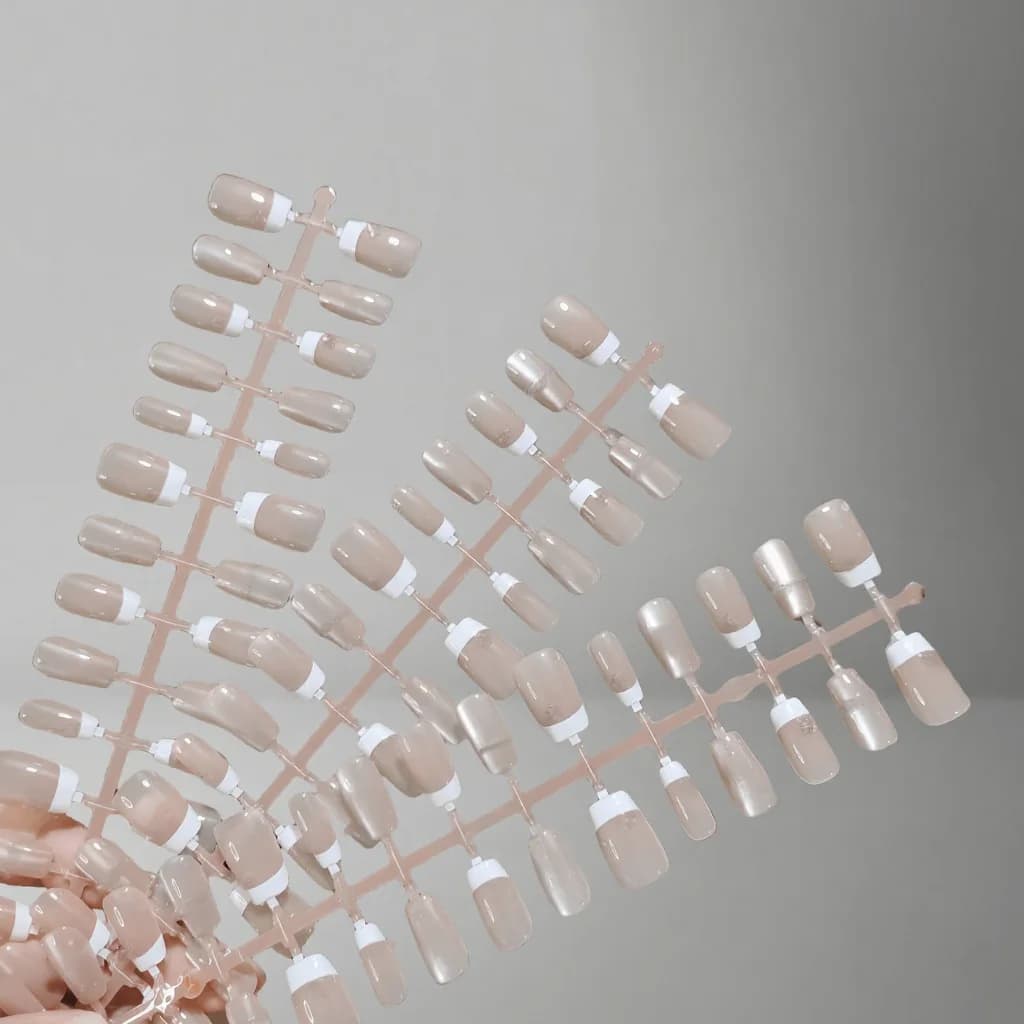 Zestaw do manicure: nakładane paznokcie z różową kokardką, krótkie coffin, french tip